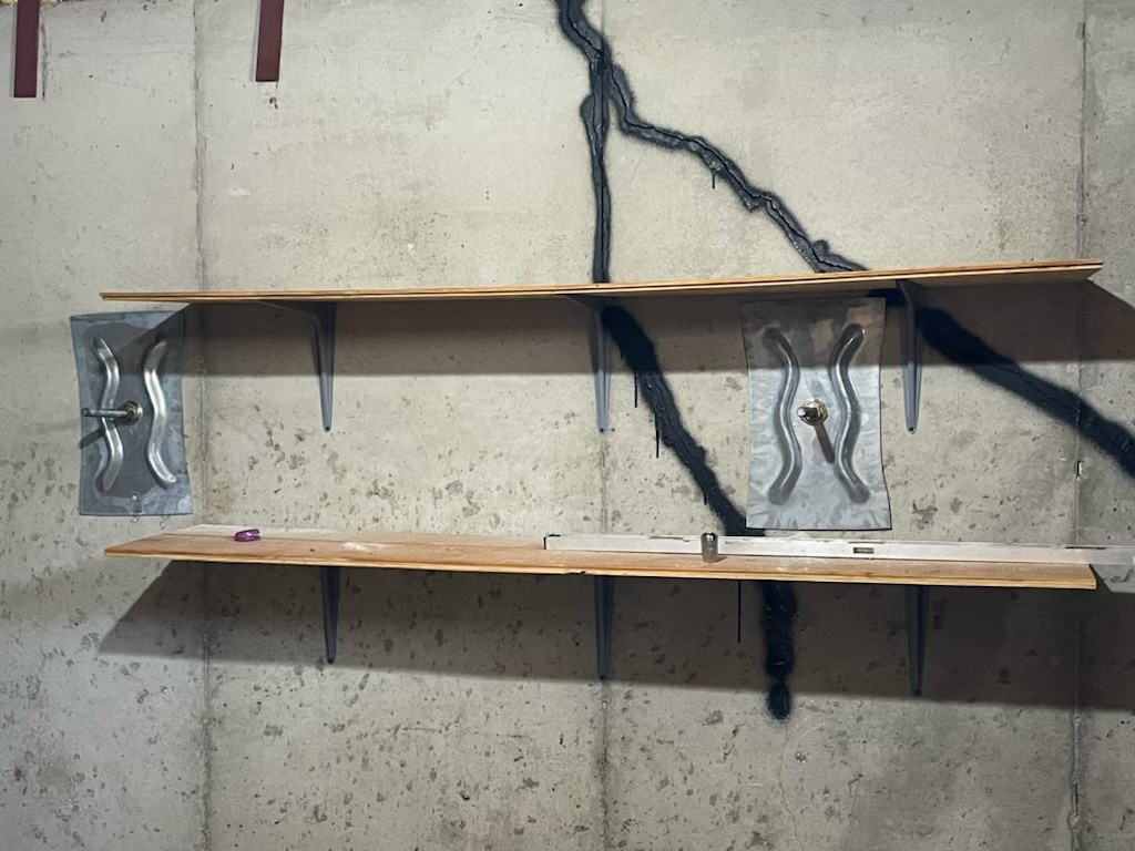 bowed wall repair - wall anchors installed