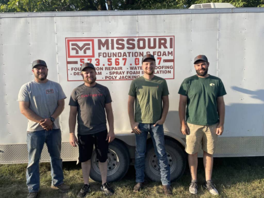 Meet the Foundation Repair Team at Missouri Foundation & Foam. Standing in front of the trailer are Lee Bell, Andrew Alton, Skyler Barker, and Josh Carr.